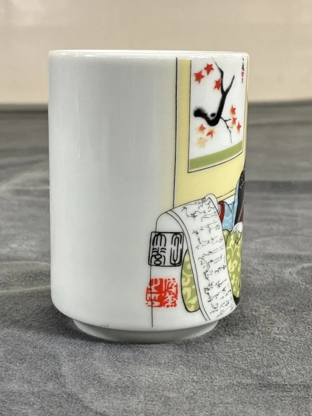 Decorative White Porcelain Art Cup with Multicolor Motif